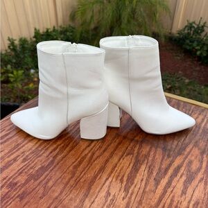 White Ankle Boots gently worn. couple marks on front of boots &underneath heal